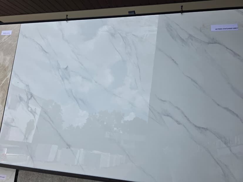 Best premium white tile flooring in Kottakkal with subtle gray veins for modern interiors